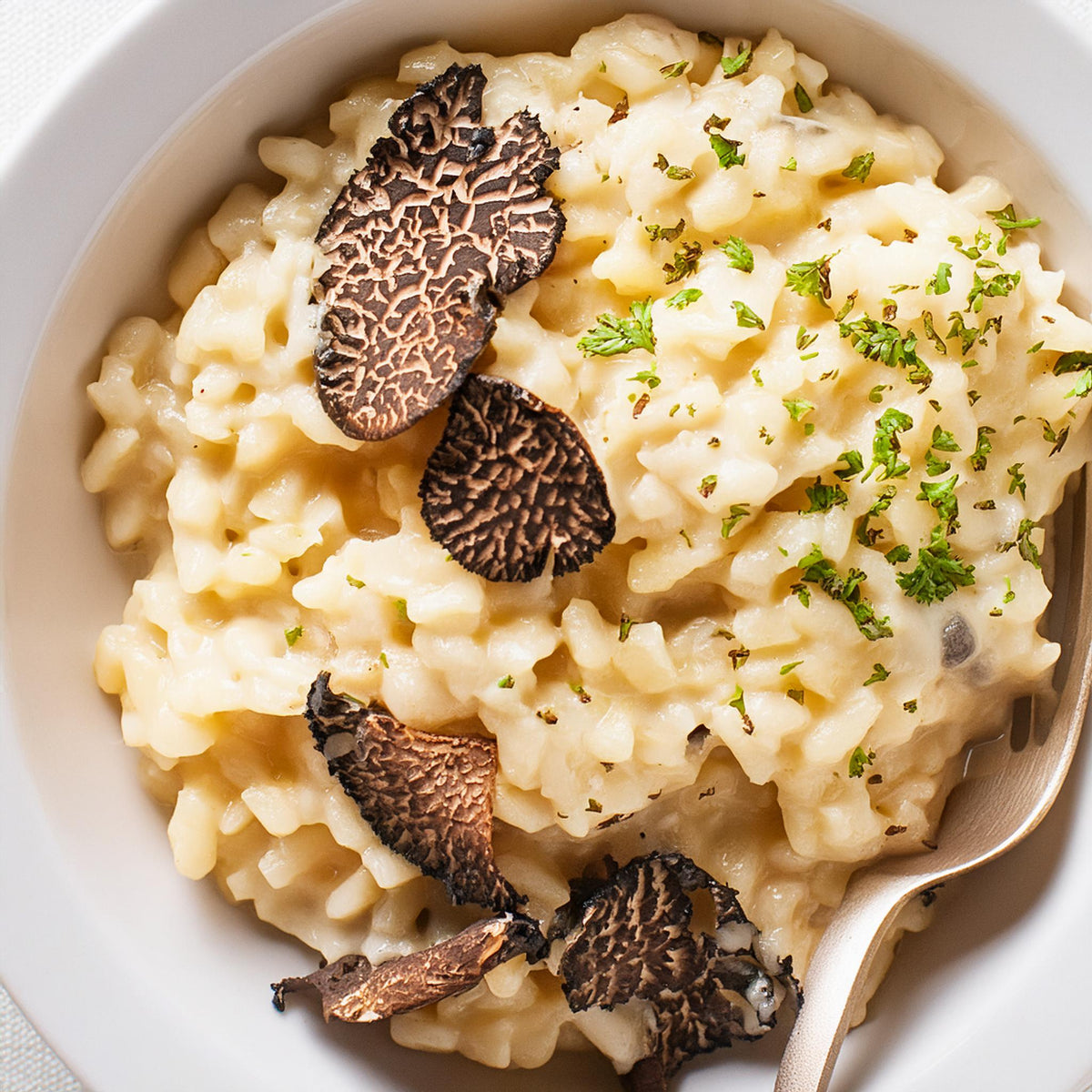 American Risotto Butter Poached Lobster and Black Truffle Risotto
