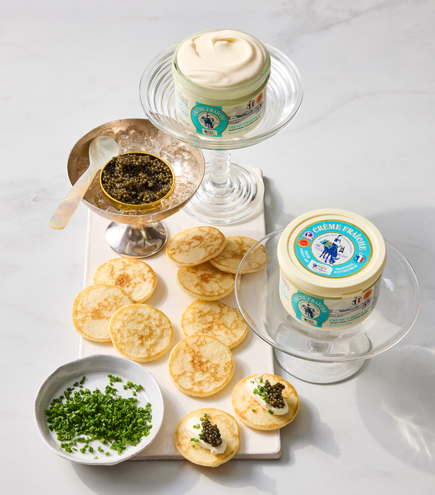 Cream fraiche from Browne Trading Company, creamy dairy product in a glass jar with a metal lid, labeled Isigny Weinberg.