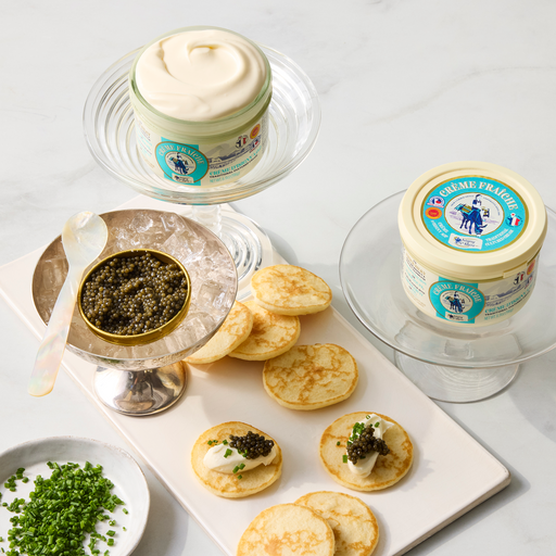 Creamy creme fraiche from Browne Trading Company, shown in a container with a smooth, rich texture perfect for culinary use.