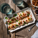 Fresh Maine dayboat scallops from Browne Trading Company, displayed as raw scallops suitable for crudo or seafood dishes.