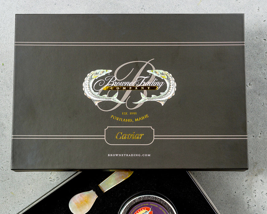 black gift box lid with a white logo
