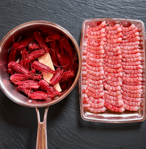 Fresh Gambero Rosso prawns with heads intact, displayed by Browne Trading Company for seafood enthusiasts.