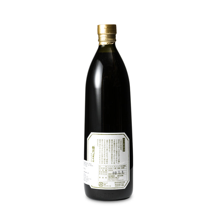 Back view of 900ml bottle of Mitsuboshi Soy Sauce by Horikawaya Nomura, showcasing the label and bottle shape.