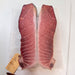 Two cross sections of Dry Aged Tuna Toro showing the deepened color from the aging process 