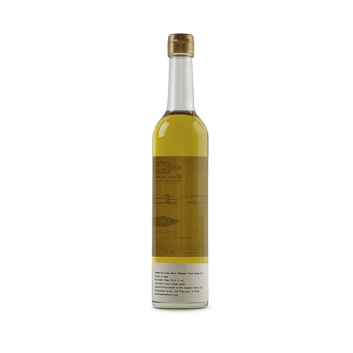 Back view of Wadaman black sesame oil bottle, 500ml, showing the label and dark glass container.
