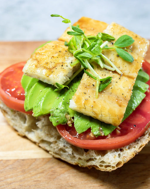 smoked eel on an open faced sandwich