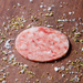 Thin slices of Gambero Rosso prawn carpaccio from Browne Trading Company, arranged on a plate with garnish.