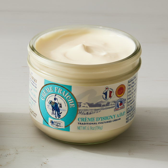 Jar of Crème Fraçée on a wooden surface